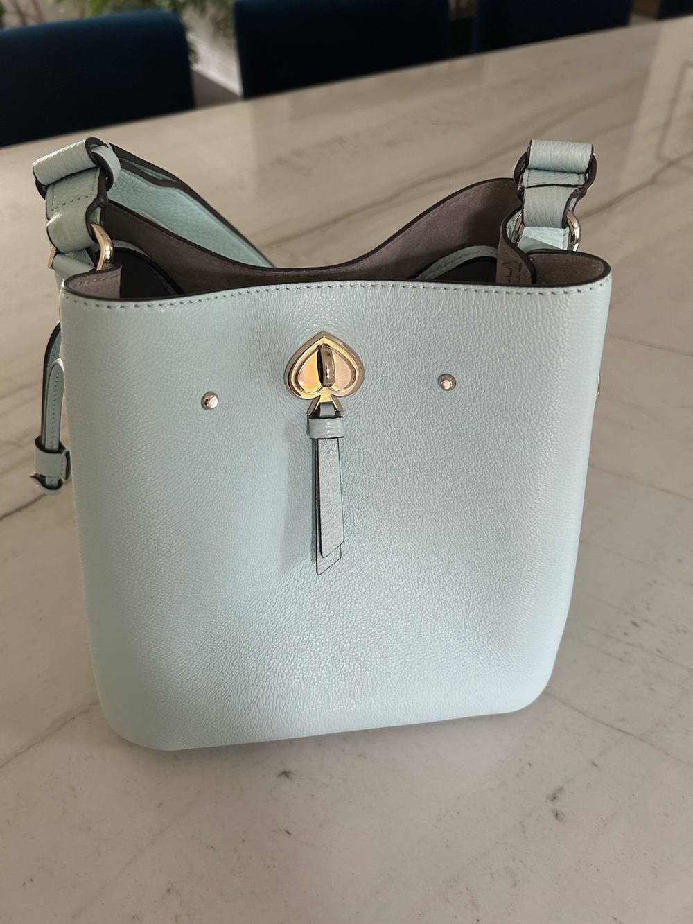 kate spade light blue leather shoulder bucket bag with gold heart clasp